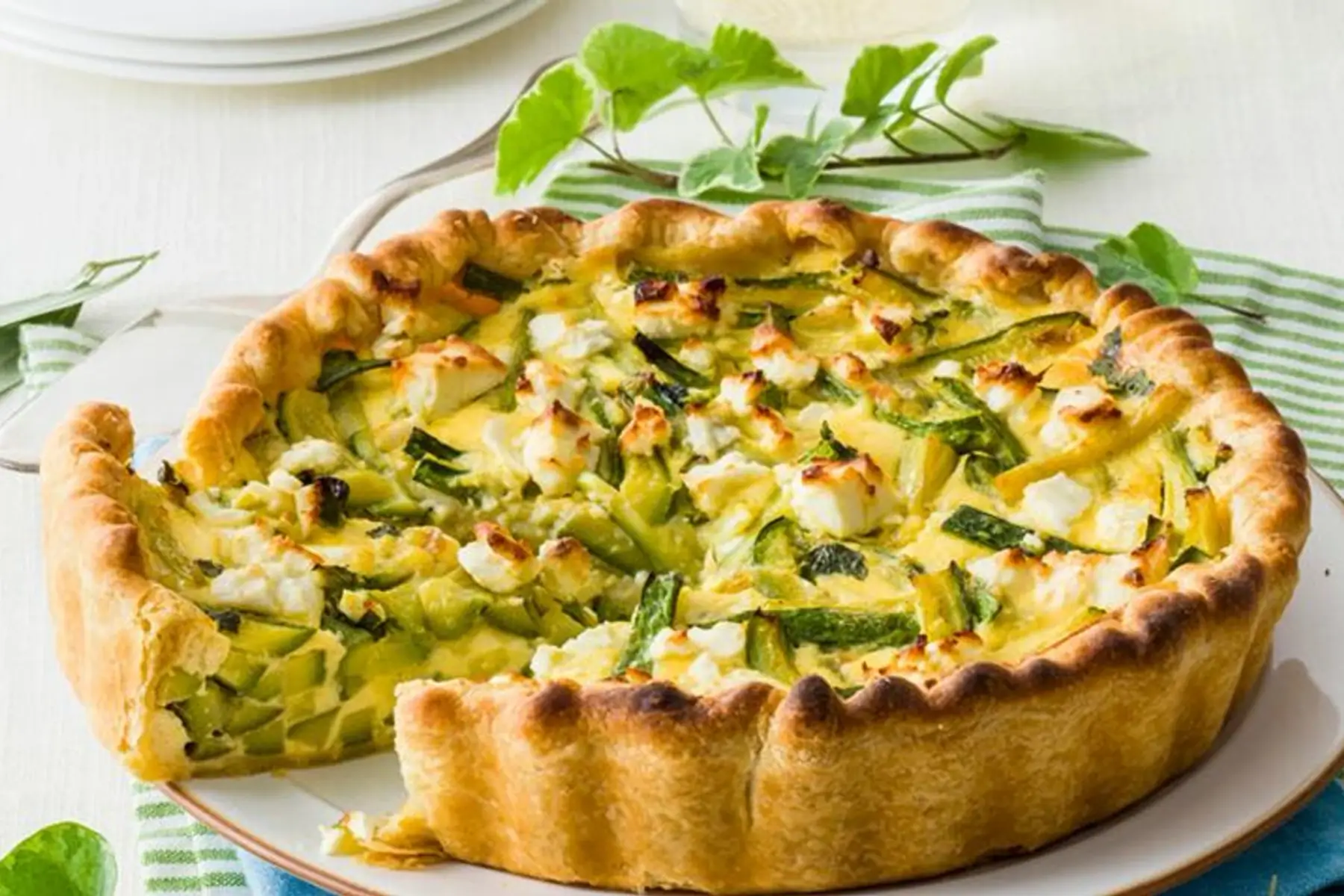 Tarte à la courgette ricotta, curcuma et pignon de pin