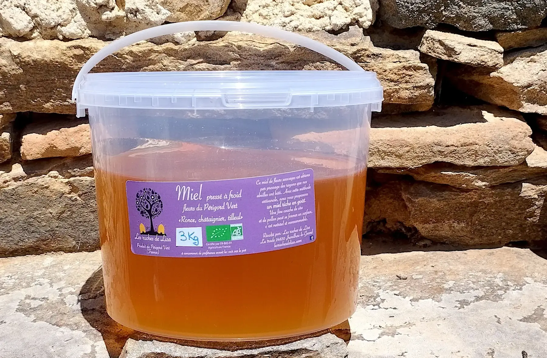 Miel pressé en seau